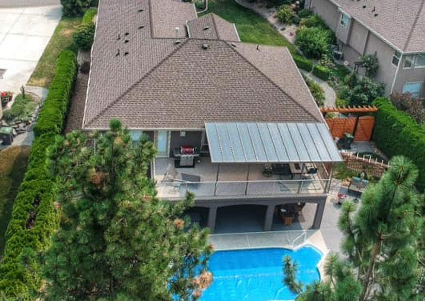 glass top patio overlooking pool aerial