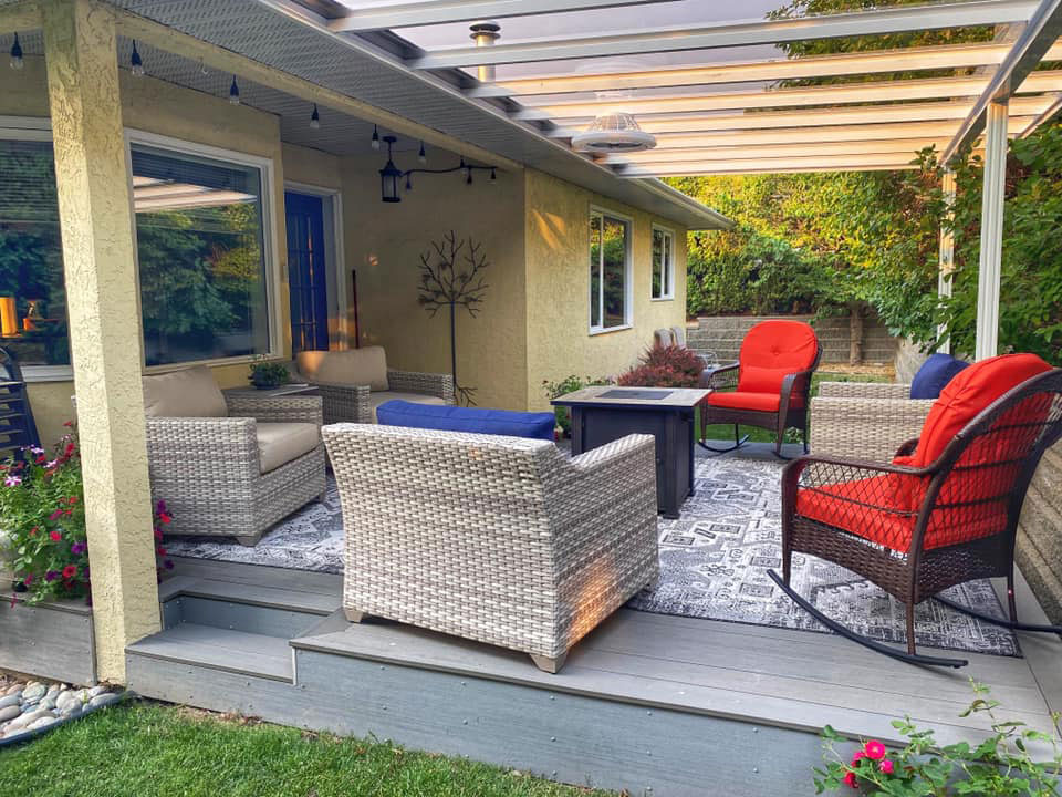 white patio cover with glass and nice furniture